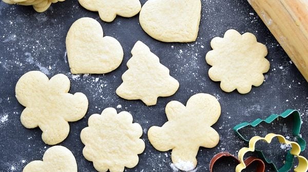 different shaped sugar cookies on a black background