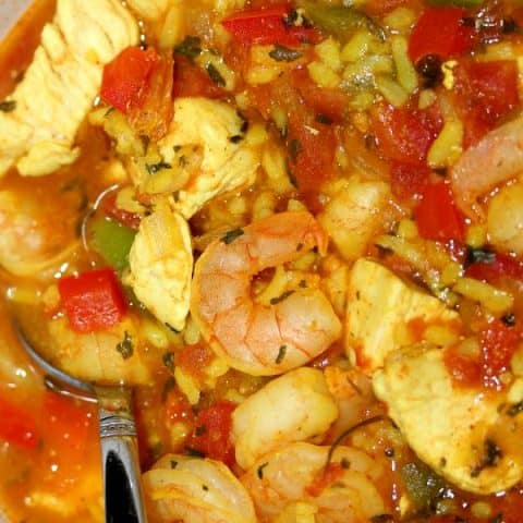 close up of Chicken and Shrimp Paella in a bowl