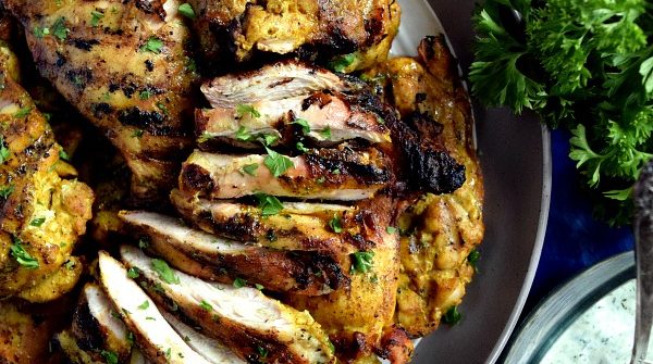 Grilled Chicken Shawarma Sliced on a plate ready to be added to a pita