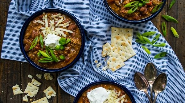 3 bowls of Secret Ingredient Turkey Chili on a tabletop