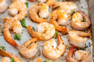 close up of oven baked shrimp recipe on a sheet pan
