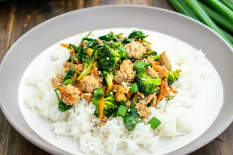 plate full of rice and ground pork stir fry