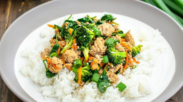 plate full of rice and ground pork stir fry