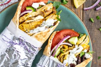 two chicken shawarma wraps on a plate