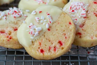 close up of a white chocolate dipped peppermint Christmas cookie