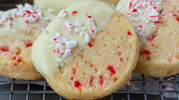 close up of a white chocolate dipped peppermint Christmas cookie