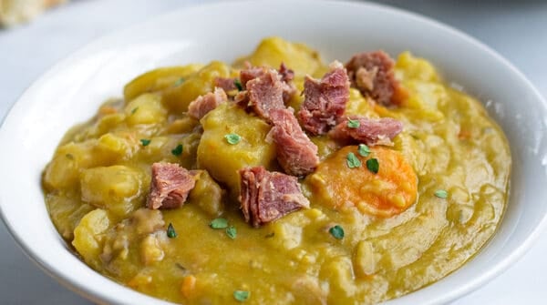 close up of pressure cooker split pea soup with ham in a bowl
