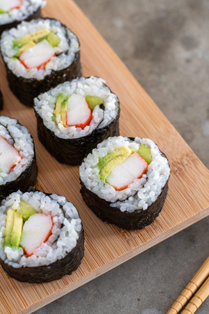 How roll sushi with bamboo mat (California Roll) 