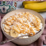 Pinterest Pin with text overlay ' Peanut Butter & Banana Cottage Cheese Breakfast Bowl', image of bowl filled with cottage cheese, banana slices, and drizzled peanut butter.