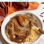 Pinterest pin with text overlay 'Chai Spice Mix', image of plate with piles of spices that make chai.