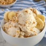 Pinterest Pin with logo overlay "The Schmidty Wife", image of a bowl filled with banana cottage cheese ice cream.