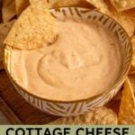 Pinterest pin with text overlay 'cottage cheese queso', image of a small yellow bowl surrounded by chips with cottage cheese queso.