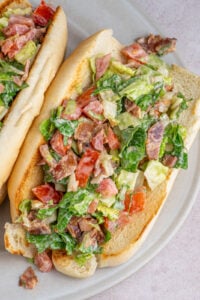 A chopped BLT sandwich on a serving platter.