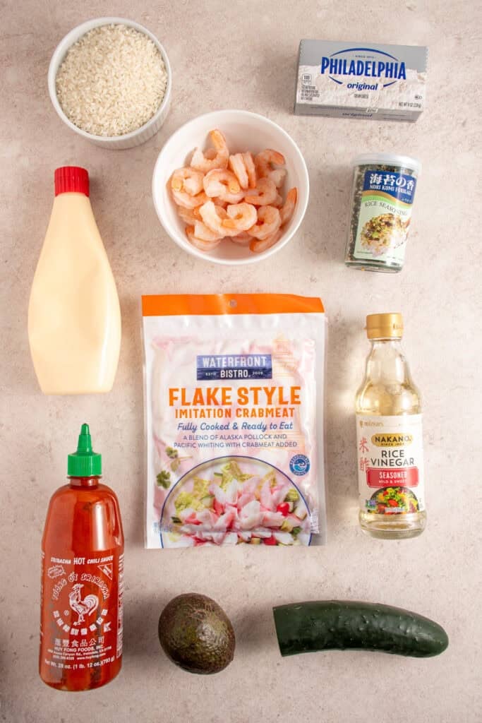Ingredients to make shrimp and crab bake laid out on a table top.