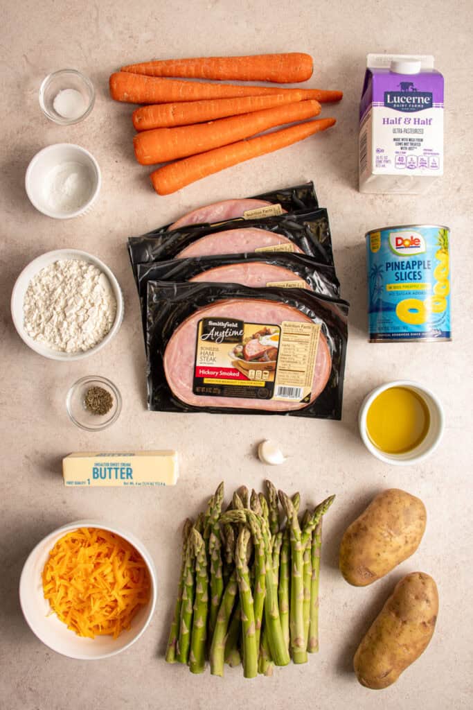 Ingredients to make sheet pan easter dinner laid out on a tabletop.