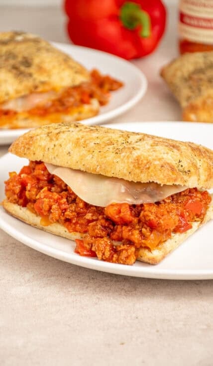 A Italian Sloppy Joes sandwich on a white plate.